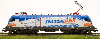 Piko 57826 (AC) – Elektrolok Rh 1116 -Taurus- der ÖBB, Werbelok – SPARDABANK-, digital (MM/DCC) 