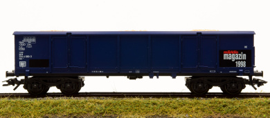Märklin 46902 – Offener Güterwagen Eaos 106 der DB AG, mit Ladeguteinsatz Holzspäne 