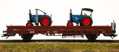 Märklin 46948 – Rungenwagen Rlmms 58 der DB mit LANZ-Traktoren 