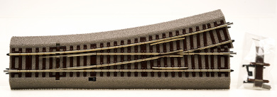 Roco 42534 – Weiche links Wl15 mit Handantrieb, mit Bettung 