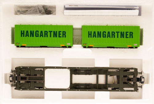 Märklin 47453-03 – Taschenwagen mit LKW-Wechselaufbauten Hangartner der SBB 